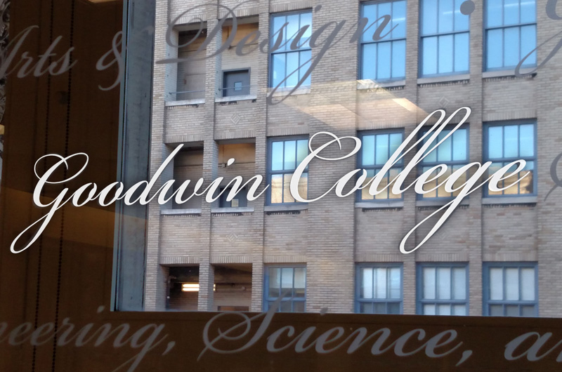 Goodwin College etched on glass in the Main Building.